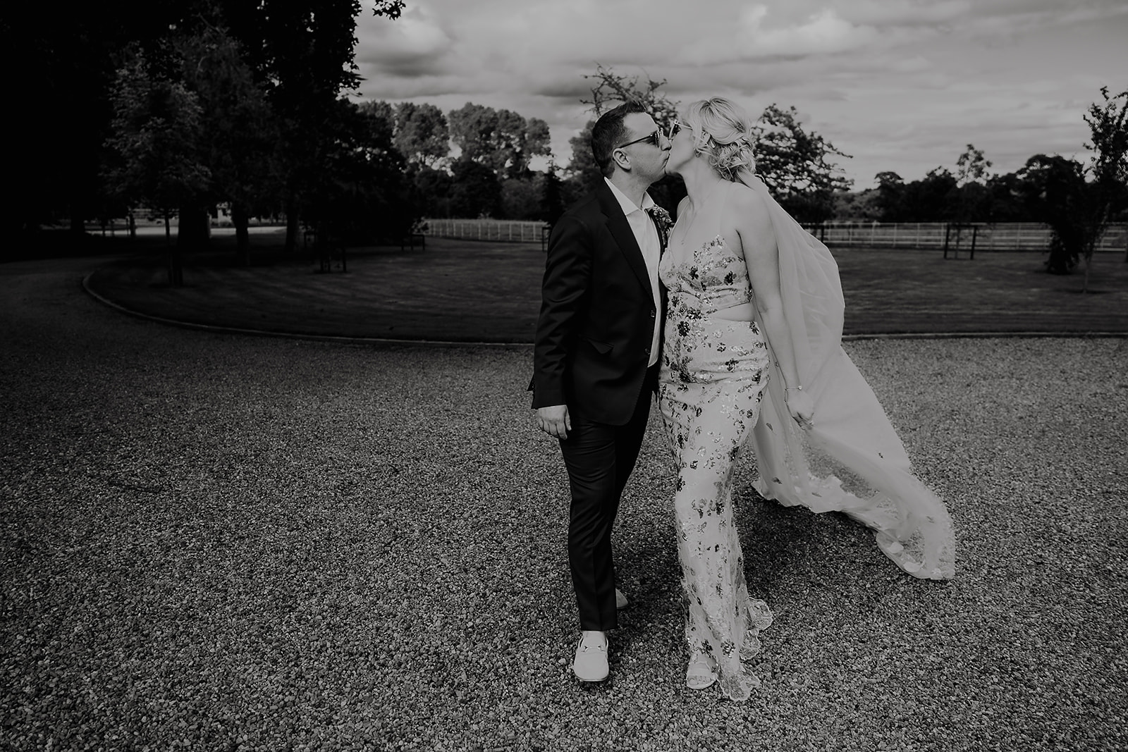 Jean and John sharing a kiss during a short walk in the grounds at Ballymagarvey Village